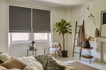 brown and white check patterned roman blind