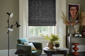 Cley mole black roman blind in living room
