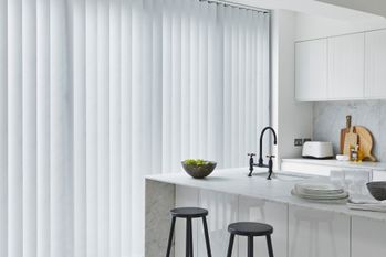 Iowa frost vertical blinds in bright white modern kitchen
