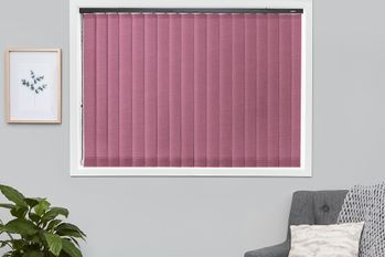 Tresco Plum purple vertical blinds in white window frame