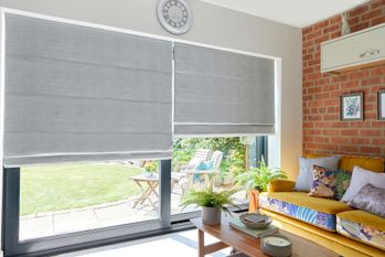 Silver Roman Blinds in Living Room