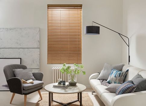 Modern living room with faux wood venetian blinds