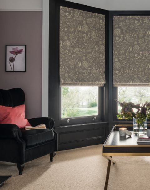 living room with oralia dove roman blinds in bay window