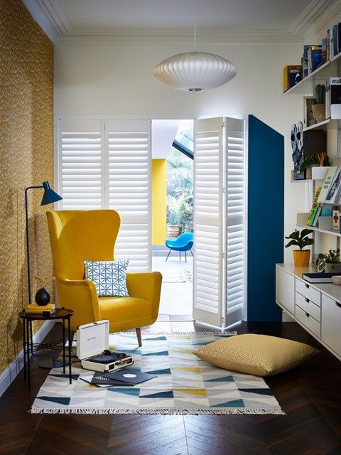 Tracked kitchen shutters in Extra White