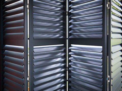 Clay tracked shutters in kitchen