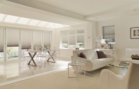 Taupe Pleated Conservatory Blinds in a modern open plan living and dining space