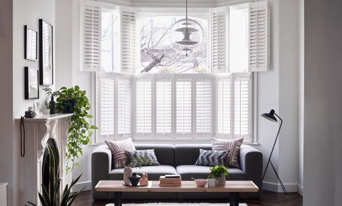 White Windsor Shutters in bay window