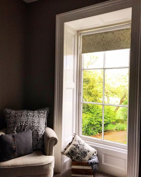 floral roller blinds in living room