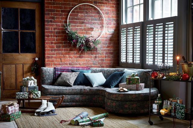 cafe style shutters installed on windows of living room