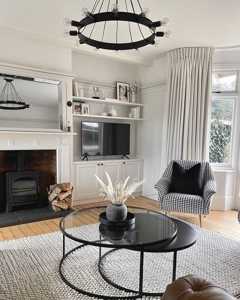 White curtains dressed on windows of living room