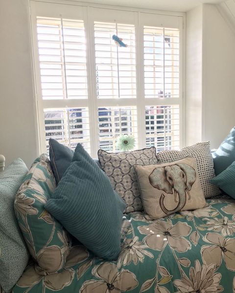 Decorators white full height shutters in living room