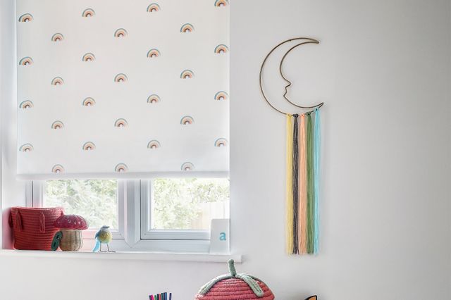 Summer sky rainbow roller blind in child's bedroom