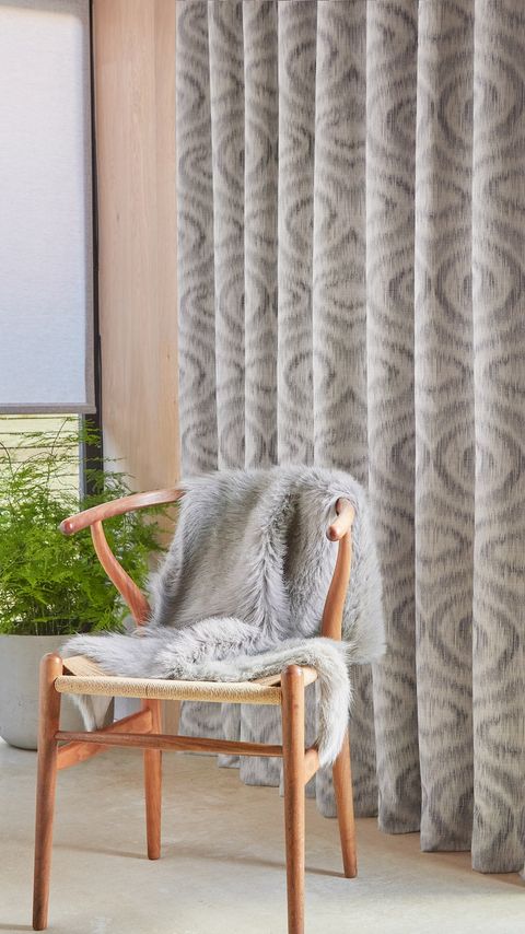 Tranquil Ash Roller blind compose shadow window dressing in a kitchen window