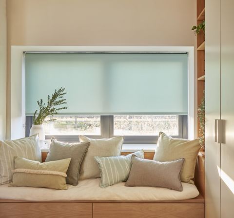 Karma Spring roller blind in a lounge window