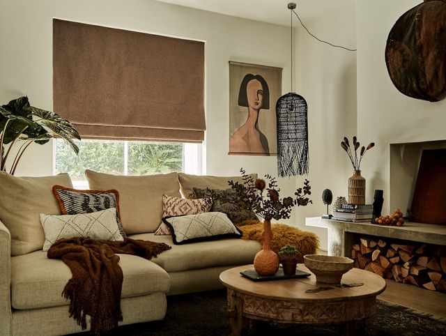 sulby ochre roman blind in modern rustic living room