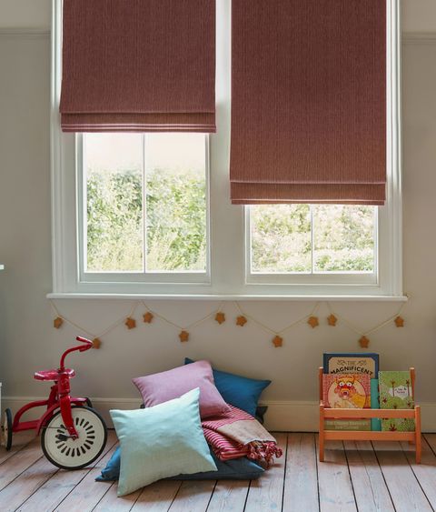 Solar Fuchsia roman blind in childrens bedroom