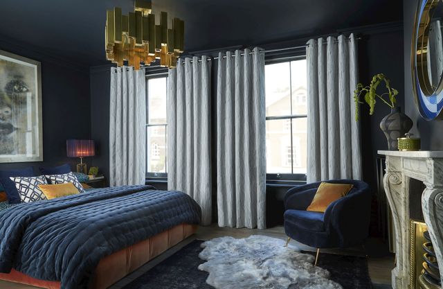 Maud steel floor length eyelet curtains in dark themed bedroom