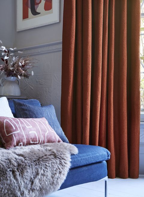 Two pairs of soho boucle spice pinch pleat curtains in bay window in living room