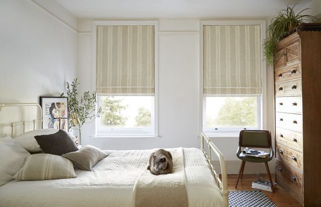 Duke olive striped roman blinds in light cream bedroom