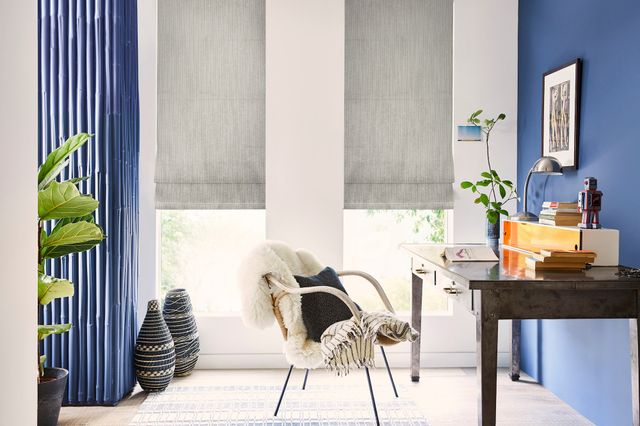 Flourish silver long roman blinds on skinny windows in home study area