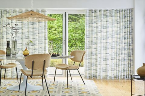 Mist slate wave curtains in open plan dining area