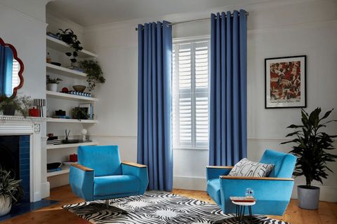 faso cornflower blue eyelet curtains in living room