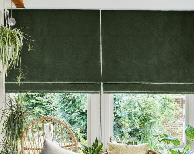 soho boucle forest roman blinds in green living room