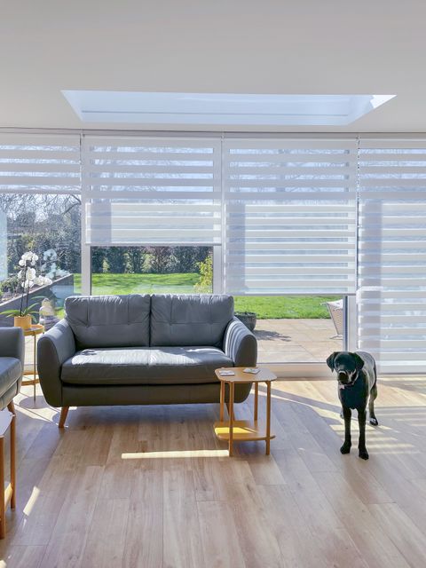 dusk white dimout day and night blinds on large sliding patio doors in conservatory