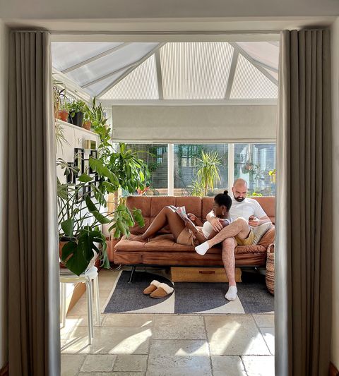 serene dove roman blind in conservatory