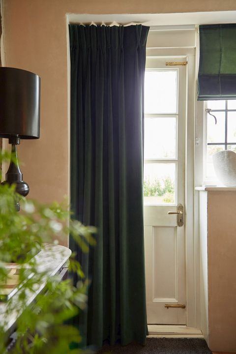 darcia emerald velvet curtains covering front door