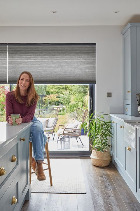 duette charcoal pleated blinds on sliding patio doors in kitchen