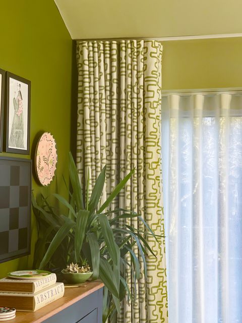 Kiwi-wave-header-curtains-white-voile-wave-header-curtains-hanging-in-a-room-with-echo-effect