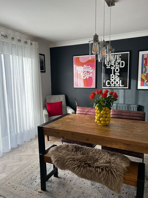 A-cozy-dining-room-setup-with-a-table-chairs-accented-by-Oxford-white-voile-curtains-by-Lyndsey-Wardman