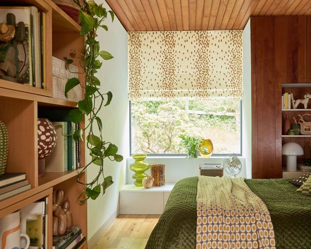 Poodle and Blonde Tottenham Dalmatian Roman Blinds in the Bedroom